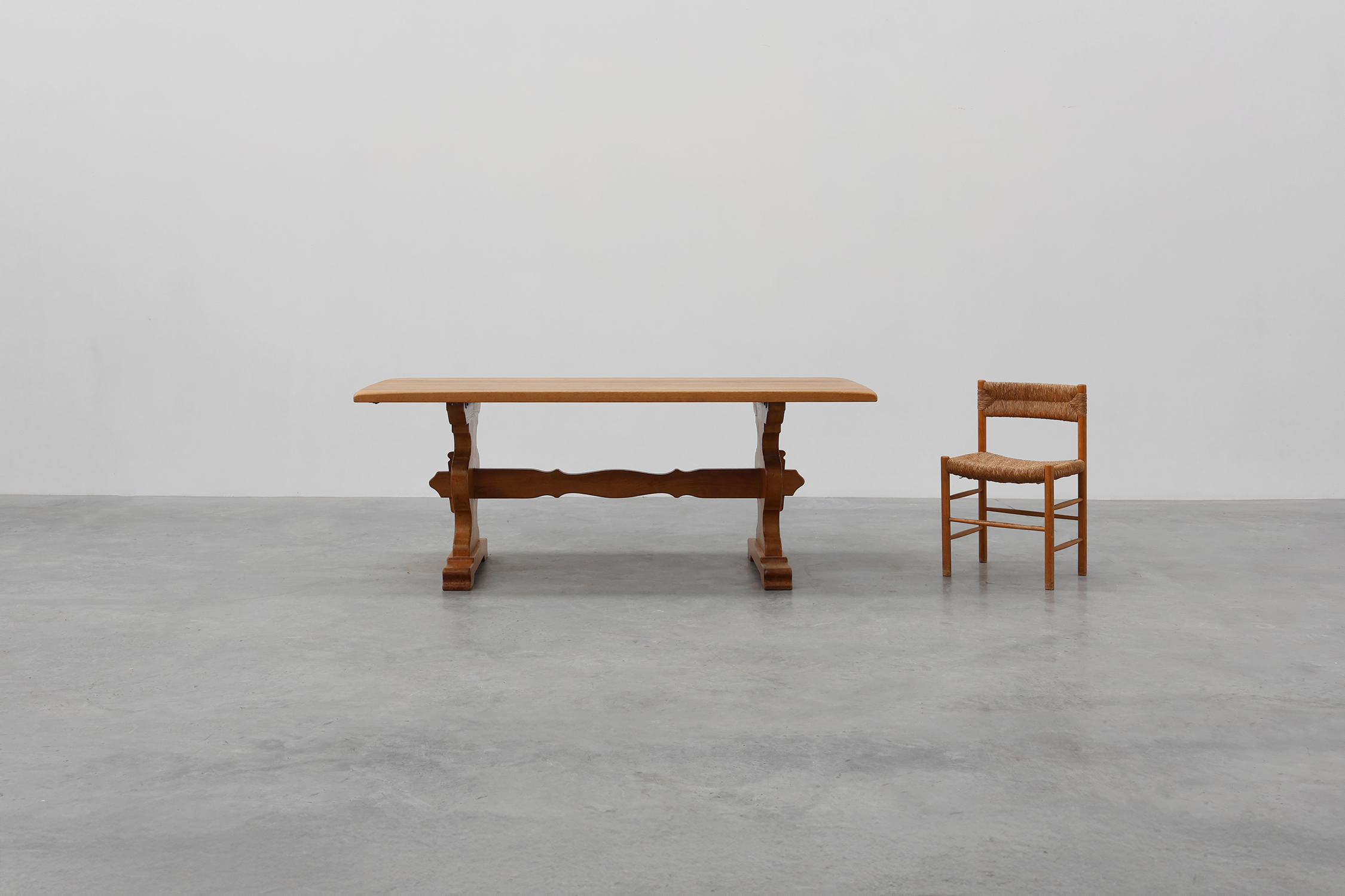 20th Century French oak trestle table with scalloped legs and plank topthumbnail